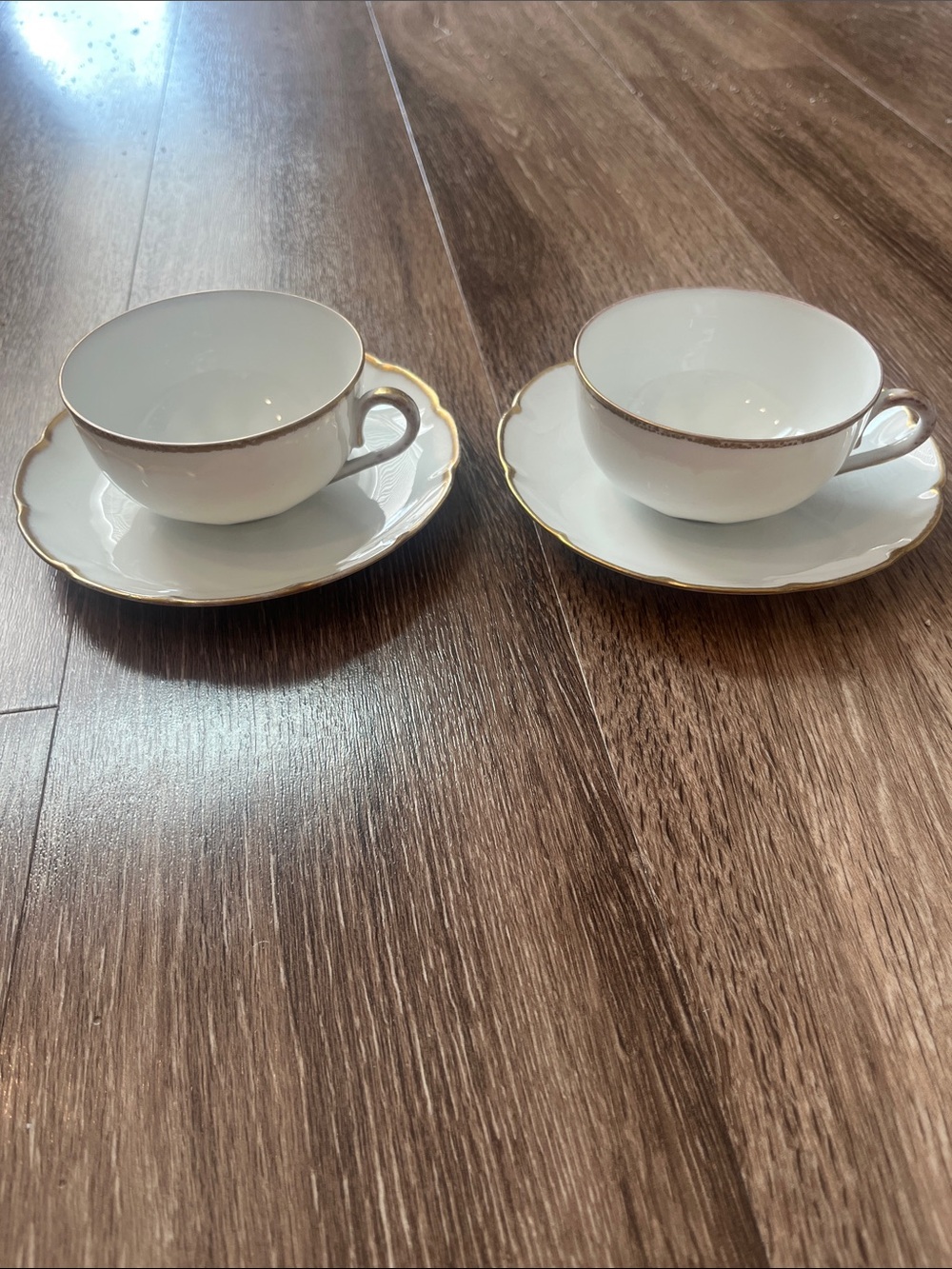 Vintage Victoria Austria White Porcelain Teacups with Gold Trim - Set of 2